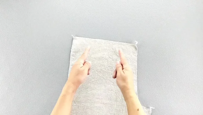 Press the darts towards the center back.