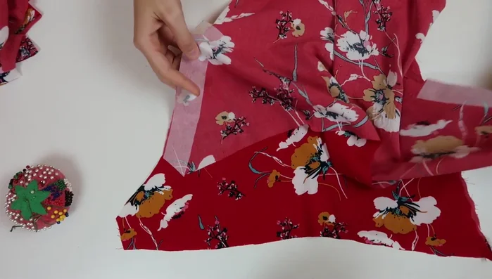 Baste stitch the curved portion of the bodice for gathering.