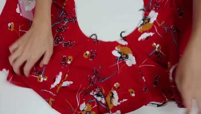 Topstitch the bodice seams after ironing allowances toward the sleeves.