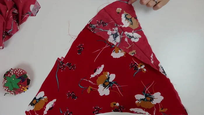 Baste stitch the curved portion of the bodice for gathering.