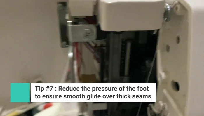 Reduce foot pressure on your sewing machine to ease movement when dealing with thick seams.
