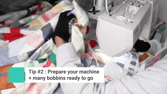 Begin quilting from the center, especially if working with a medallion quilt. If it's not a medallion, find and mark the center.