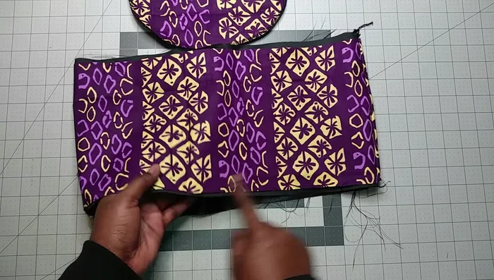 Prepare for elastic insertion: Fold over the top edge of the cap about 1 inch. Iron if needed. Measure and mark 7 inches along the folded edge (adjust for different head sizes - 6 inches for small, 9 inches for large).