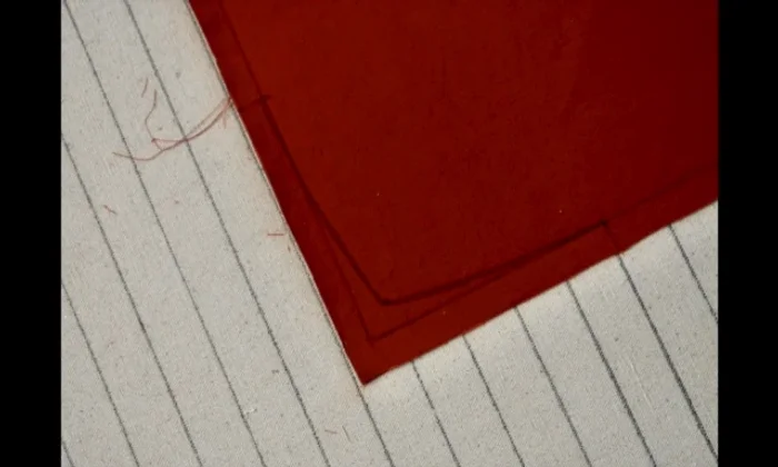 Create the tapered corners: Mark a gentle curve starting approximately 5 inches from each edge, tapering inward about 1 inch (adjust based on pillow size).