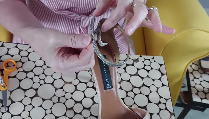 Measure and cut Velcro: Measure the length of Velcro needed, from the end of the elastic to where the buckle used to be on the shoe.