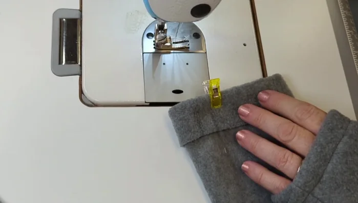 Sew the two bottom edges together using a regular seam width. Top stitch just above the seam to hide it.