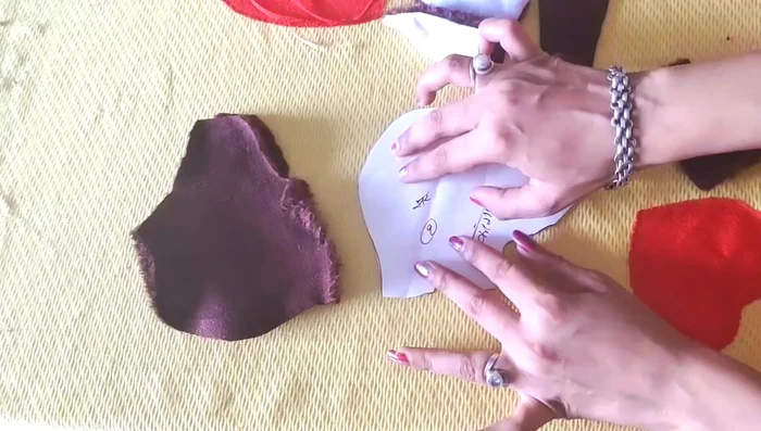 Attach the ears to the face.