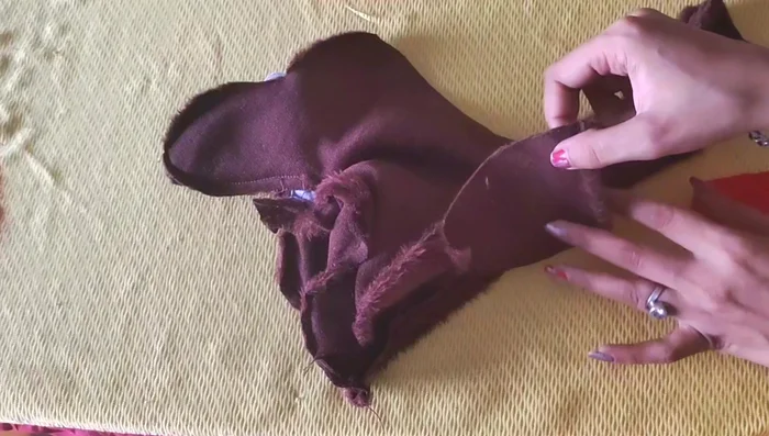 Close the openings on the body, head, and legs with a hidden stitch.