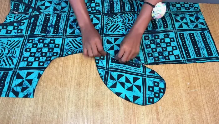 Hem the Dress: Hem the bottom of the dress.