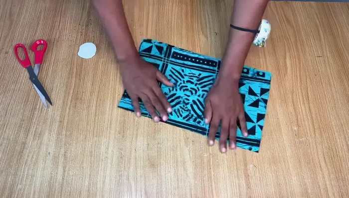 Hem the Dress: Hem the bottom of the dress.