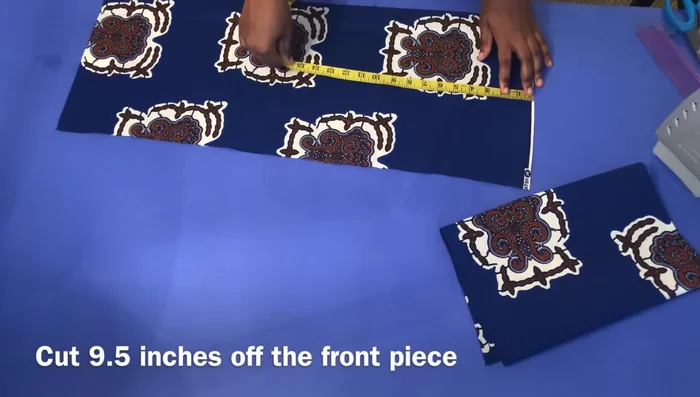 Create a small slit on the back piece, pull the front back, and measure 1 1/4 inches at the back before cutting.