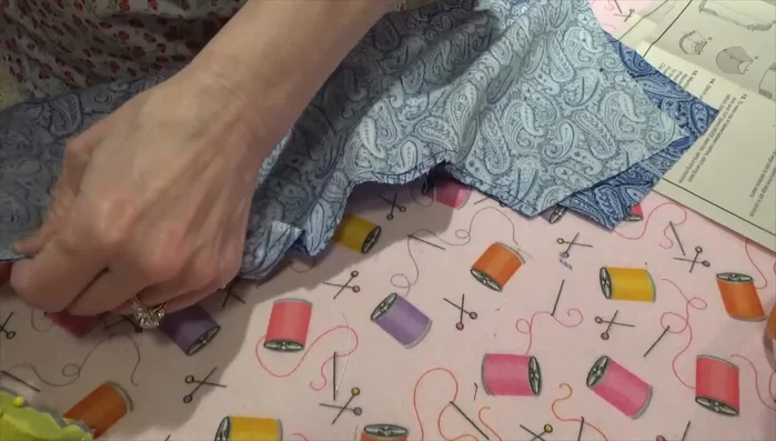 Serge or finish the shoulder seams.