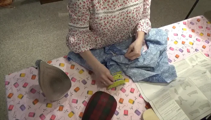 Attach the neck facing, matching notches, and press.