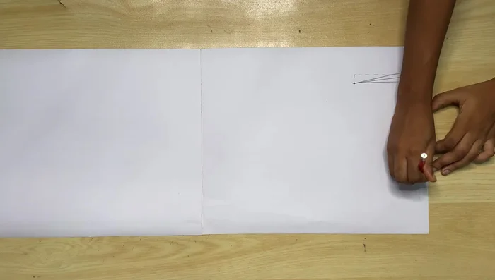 Shaping the neckline: Go in by half an inch at the center front and connect it to the neckline width.