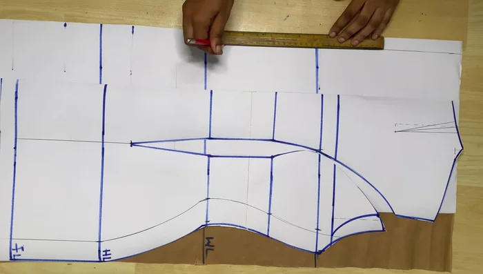 Creating the back dot: Position the dot 4 inches away from the zip allowance, 7 inches long (3.5 inches above and below the waistline), and 1 inch wide.