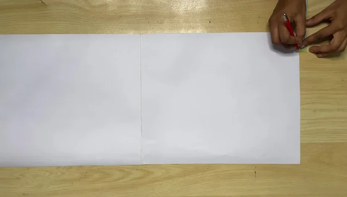 Shaping the neckline: Go in by half an inch at the center front and connect it to the neckline width.