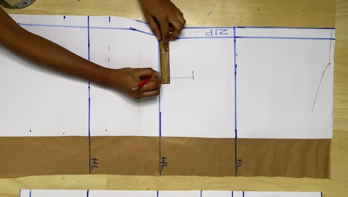 Creating the back dot: Position the dot 4 inches away from the zip allowance, 7 inches long (3.5 inches above and below the waistline), and 1 inch wide.