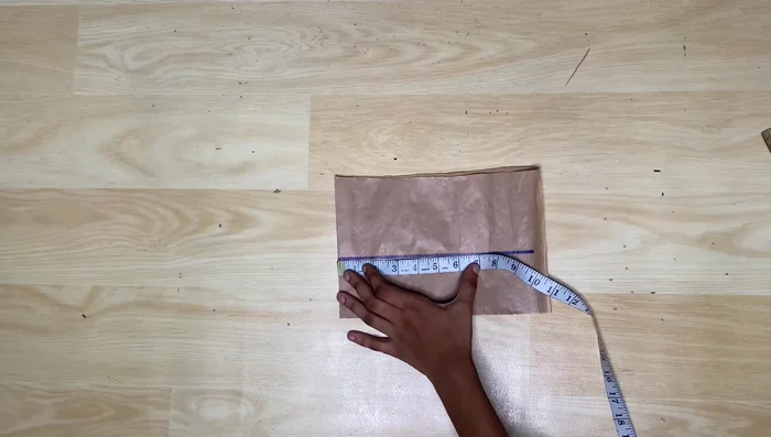 Sleeve construction: Cut the sleeve pattern (4 inches long). Divide round sleeve measurement by two and add a 1.5-inch seam allowance. Bring the corner down by 1 inch for better fit, and form the sleeve cap with a 2.5-inch curve. Use a 9.5-inch armhole measurement to attach the sleeve.