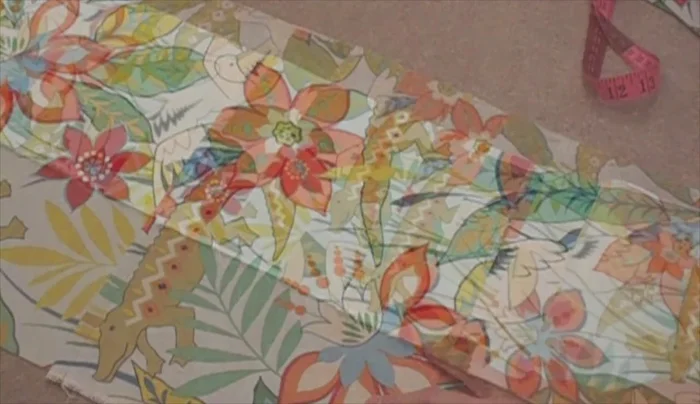 Repeat step 7 until all nine panels are sewn to the back.