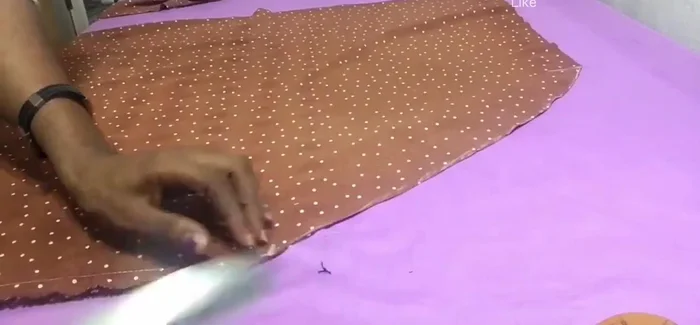 Cut along the markings, trimming sharp edges for a smooth curve.