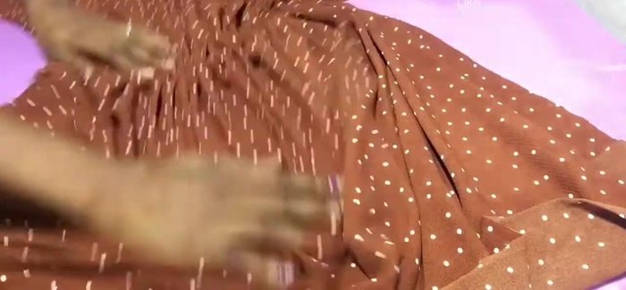 Stitch down the gathered front drip.