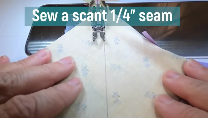 Sew a scant 1/4 inch down one side, then back along the other.