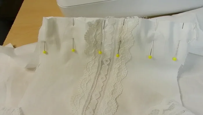 Construct the bodice using French seams. Sew wrong sides together, trim, flip, and sew again to enclose raw edges for a clean finish. Repeat for side seams and shoulders.