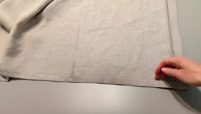 Hem the bottom: Overlock the bottom of the shirt and press to 2cm. Stitch the bottom.