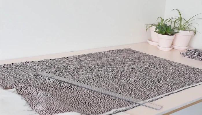 Measure and cut skirt pieces (65cm long for main skirt, 44cm long for ruffle, cut twice).