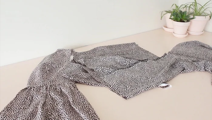 Attach the gathered ruffle to the bottom of the skirt.