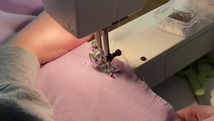 Attach gathered skirts to the bodice, ensuring even distribution and straight alignment.