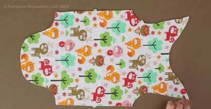 Stay stitch: Stitch 3/8 inch away from the raw edge around the neckline and bottom of the front and back pieces. This prevents distortion.