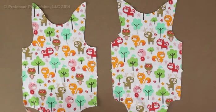 Apply binding: Attach the bias strip to the neckline and bottom edges of the front and back pieces, right sides together. Sew a 1/4 inch seam allowance. Trim the binding seam allowance to 1/4 inch, leaving the garment seam allowance intact. Fold the raw edge of the binding over to the back, enclosing the raw edges. Stitch the binding in place, using a zigzag stitch to maintain stretch. 