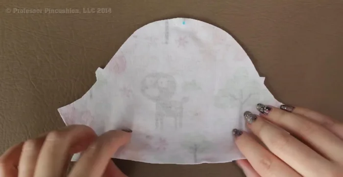 Hem sleeves: Fold up the bottom edge of each sleeve 1/2 inch, creating a straight line at the hem. Pin and stitch using a zigzag stitch.