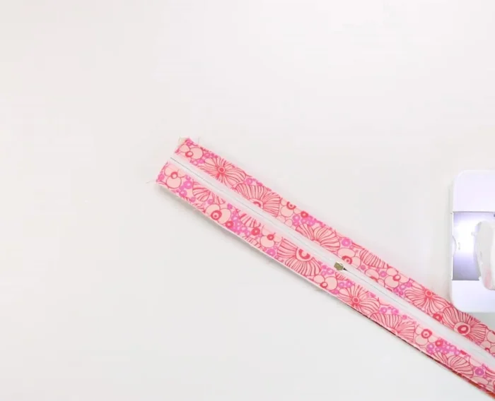 Attach zipper gussets to lower gussets.