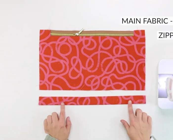 Topstitch boxes around handles for reinforcement.