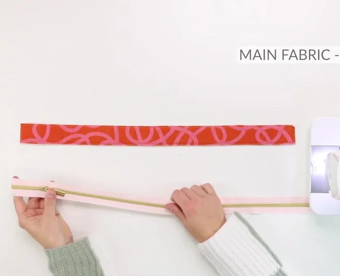 Attach zipper gussets to lower gussets.