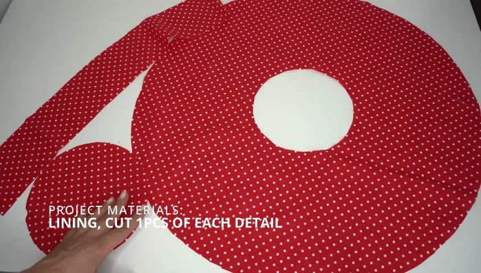 Fuse interfacing to the wrong side of all main fabric pattern details.