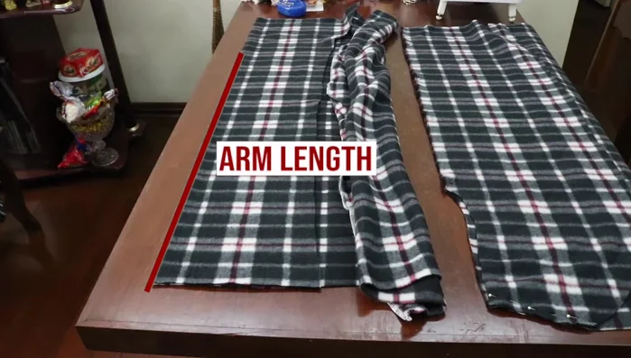 Turn sleeves right side out; Pin and sew sleeves into robe armholes.