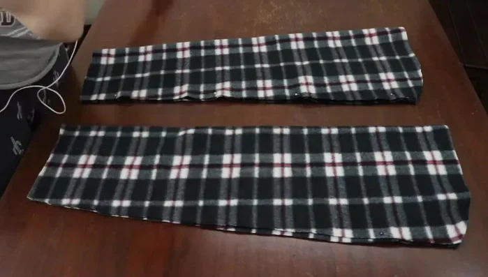 Turn sleeves right side out; Pin and sew sleeves into robe armholes.