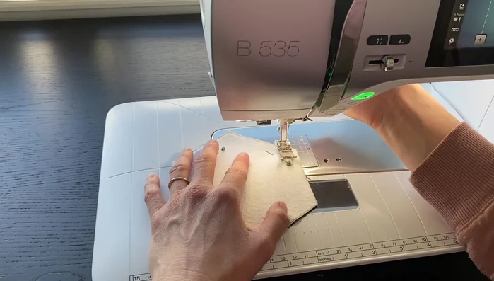 Stitch around the raw edge, backstitching at the beginning and end. Leave a 2-inch gap for turning.