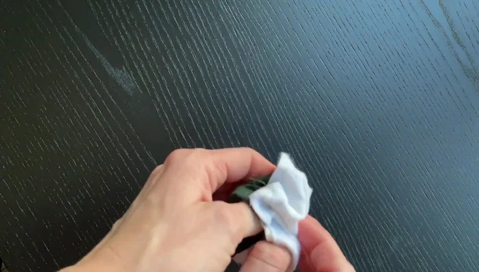 Turn the coaster right side out through the gap. Gently poke out each corner to make them sharp.