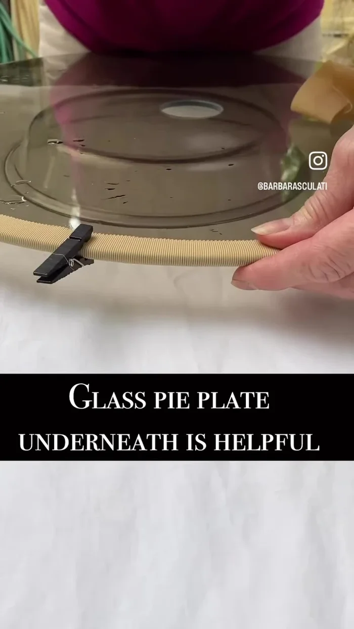 Allow the ribbon to dry completely on the glass disc.