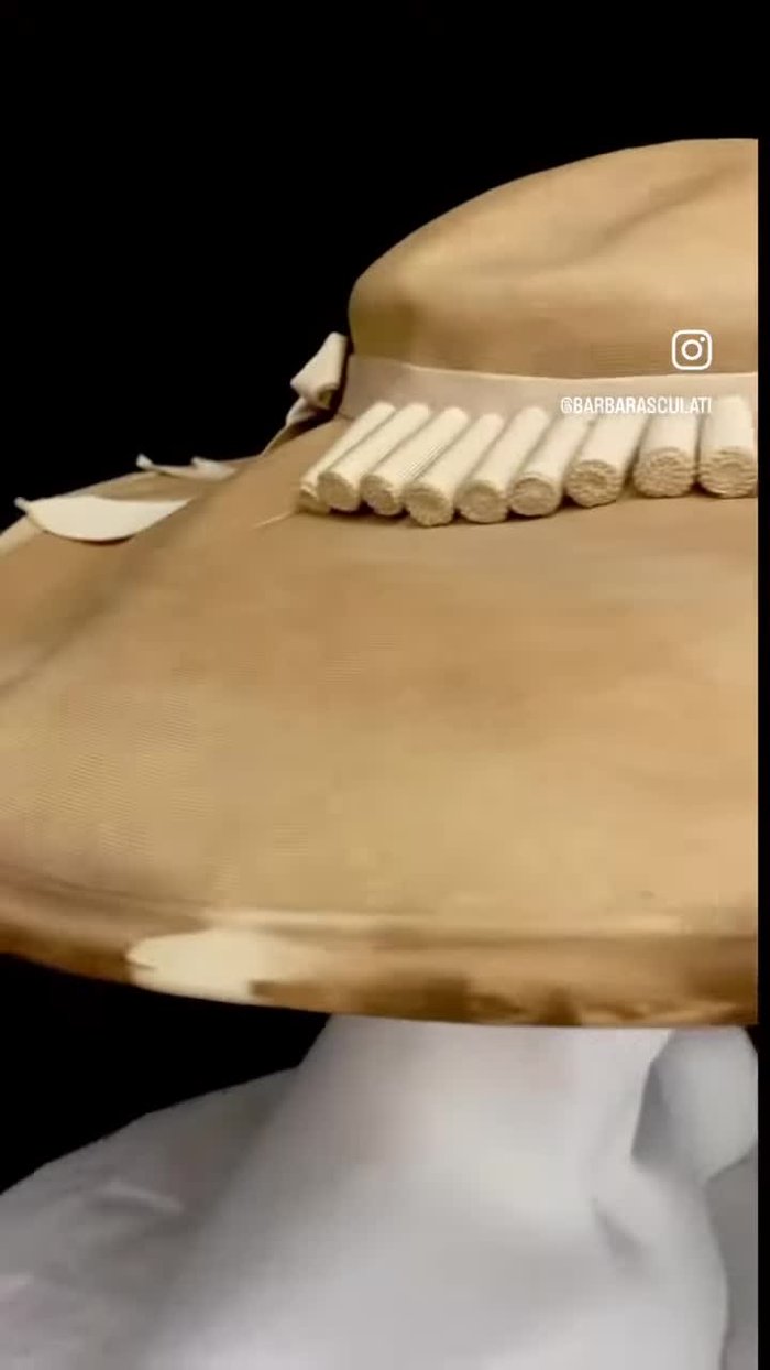 Assess the hat's damage and prepare the Peter sham ribbon.