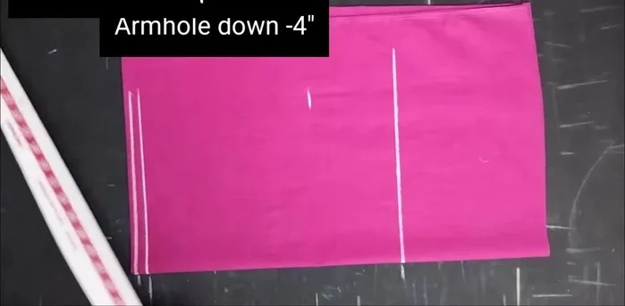 Mark the armhole (4 inches straight line).
