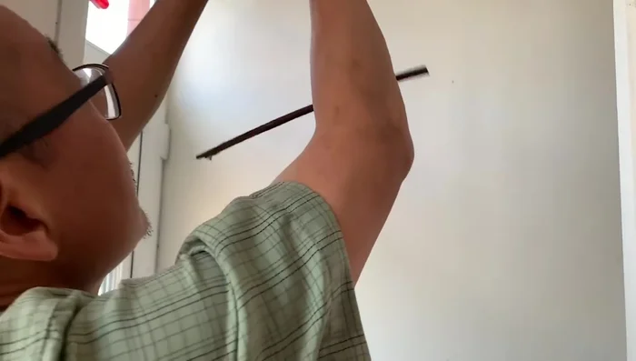 Hang the bird and adjust string lengths and coin placement to achieve balance. This may require several attempts.