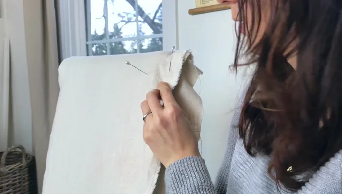 Stitch along the pinned seam lines, remove pins, and trim excess fabric (leaving about 1/2 inch).