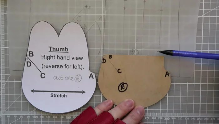 Create the thumb piece by drawing a horizontal line across the pattern from point B at right angles.