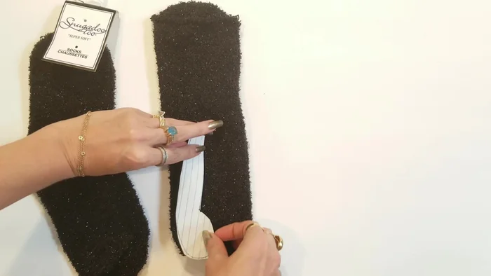 Close the leg openings: Using a ladder stitch, close the leg openings.