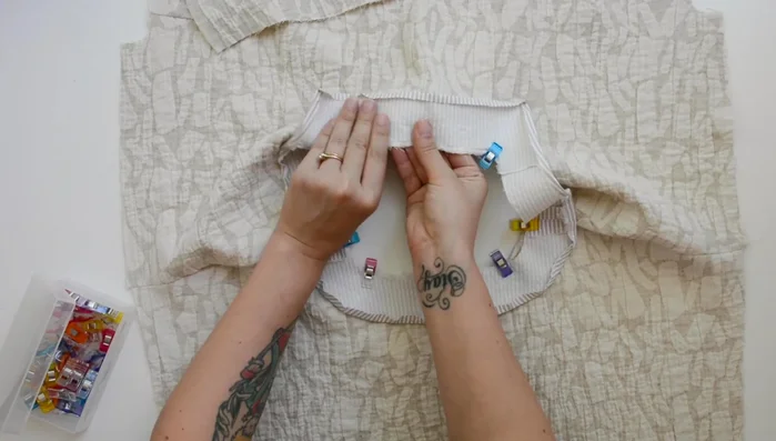 Understitch seam allowance to neckline facing.